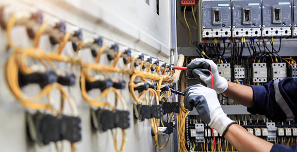Professional Electrician technician working in Nederland, TX
